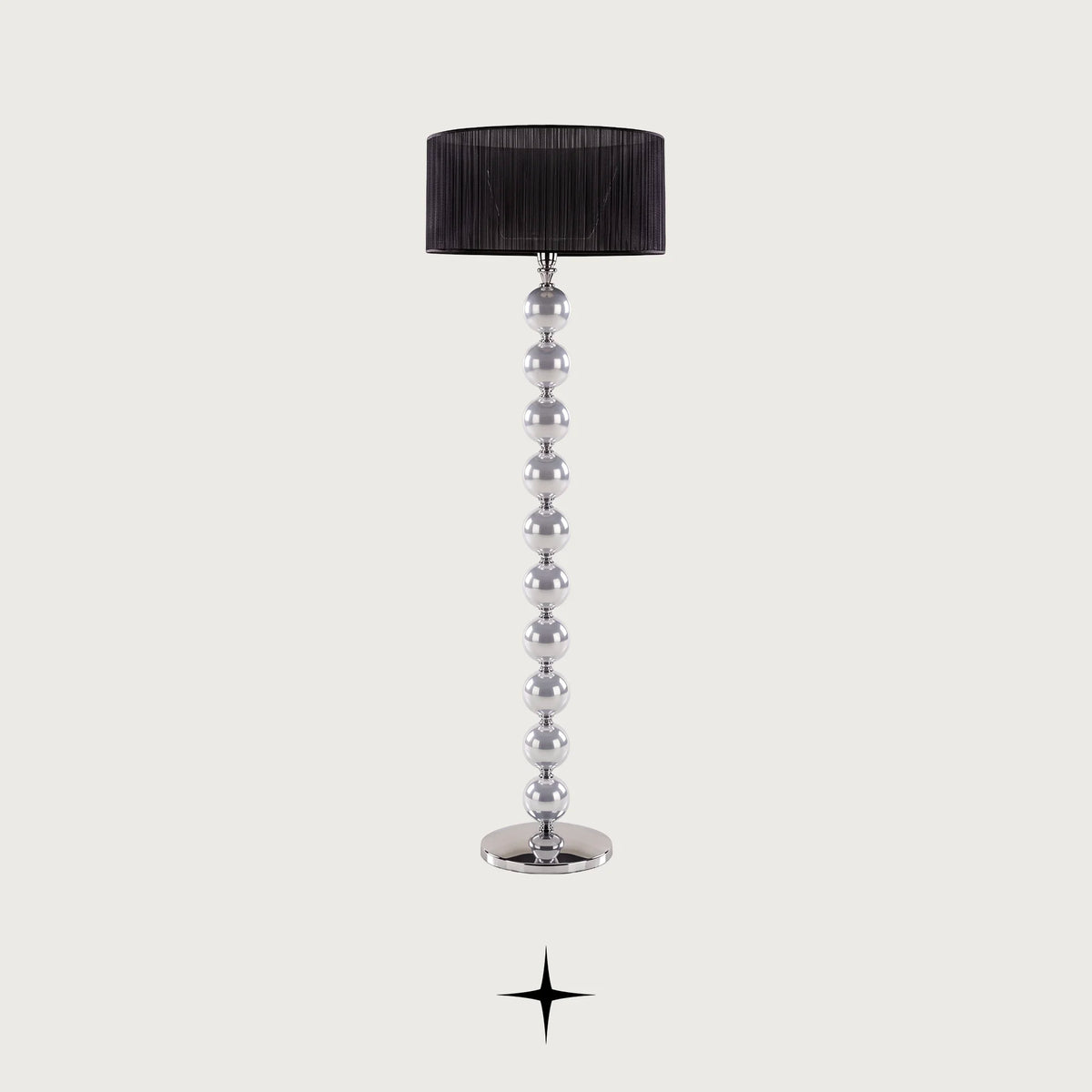 Rosalie floor lamp with stacked crystal spheres and black pleated shade on a dark background