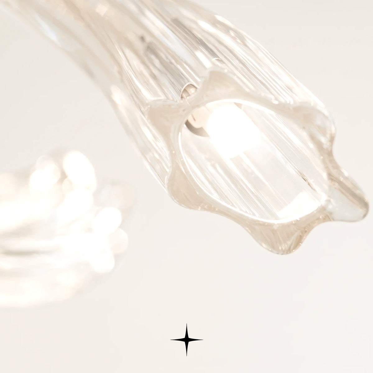 Sierra Chandelier featuring post-modern crystal design in striking colors from the Ice Age Collection