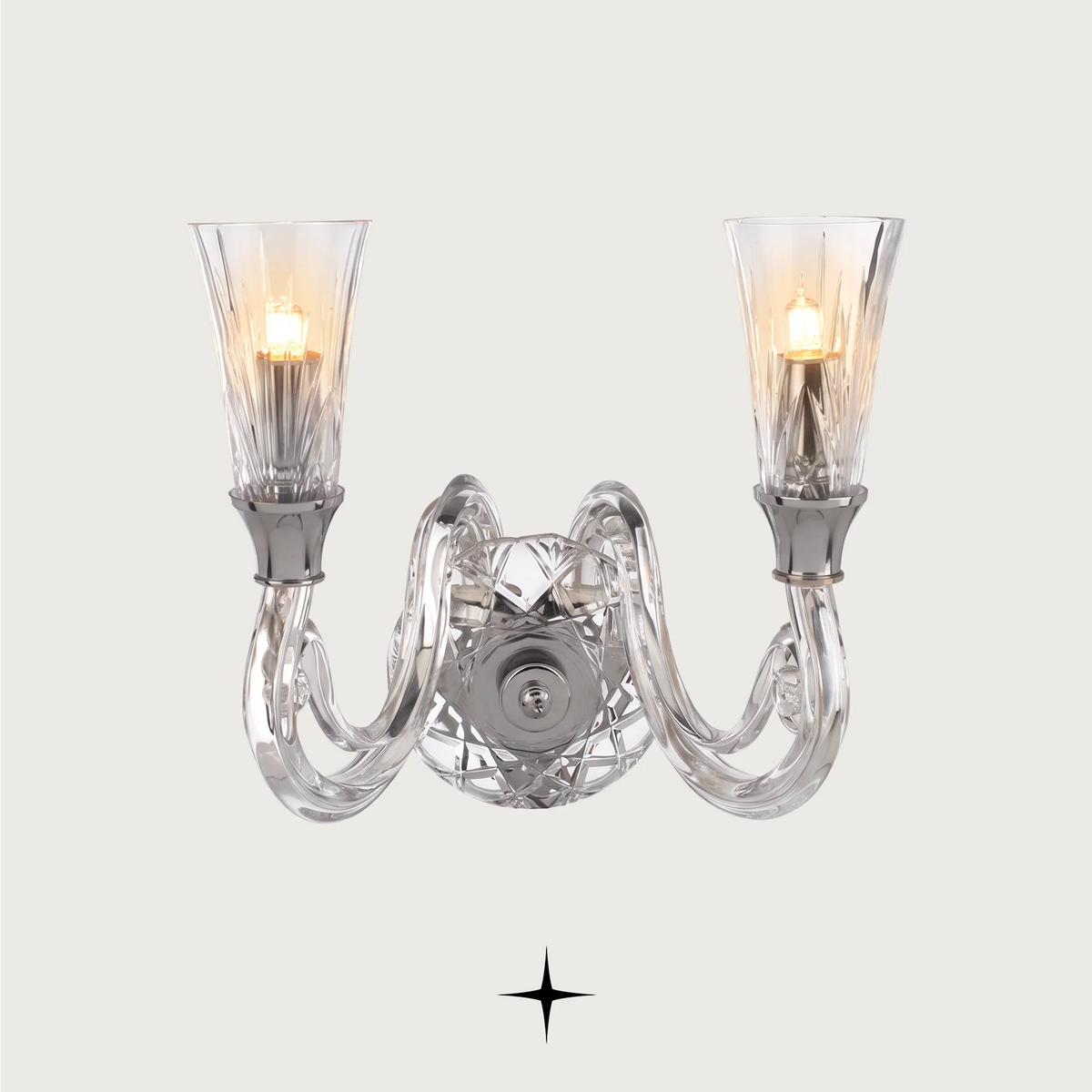 Sophia wall light fixture featuring chic elongated crystal arms and refined metallic accents.
