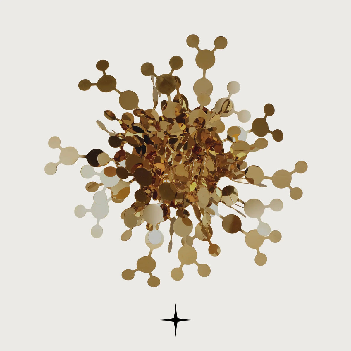 Sparkle modern gold sunburst wall sconce with metallic stems and discs on a light grey background