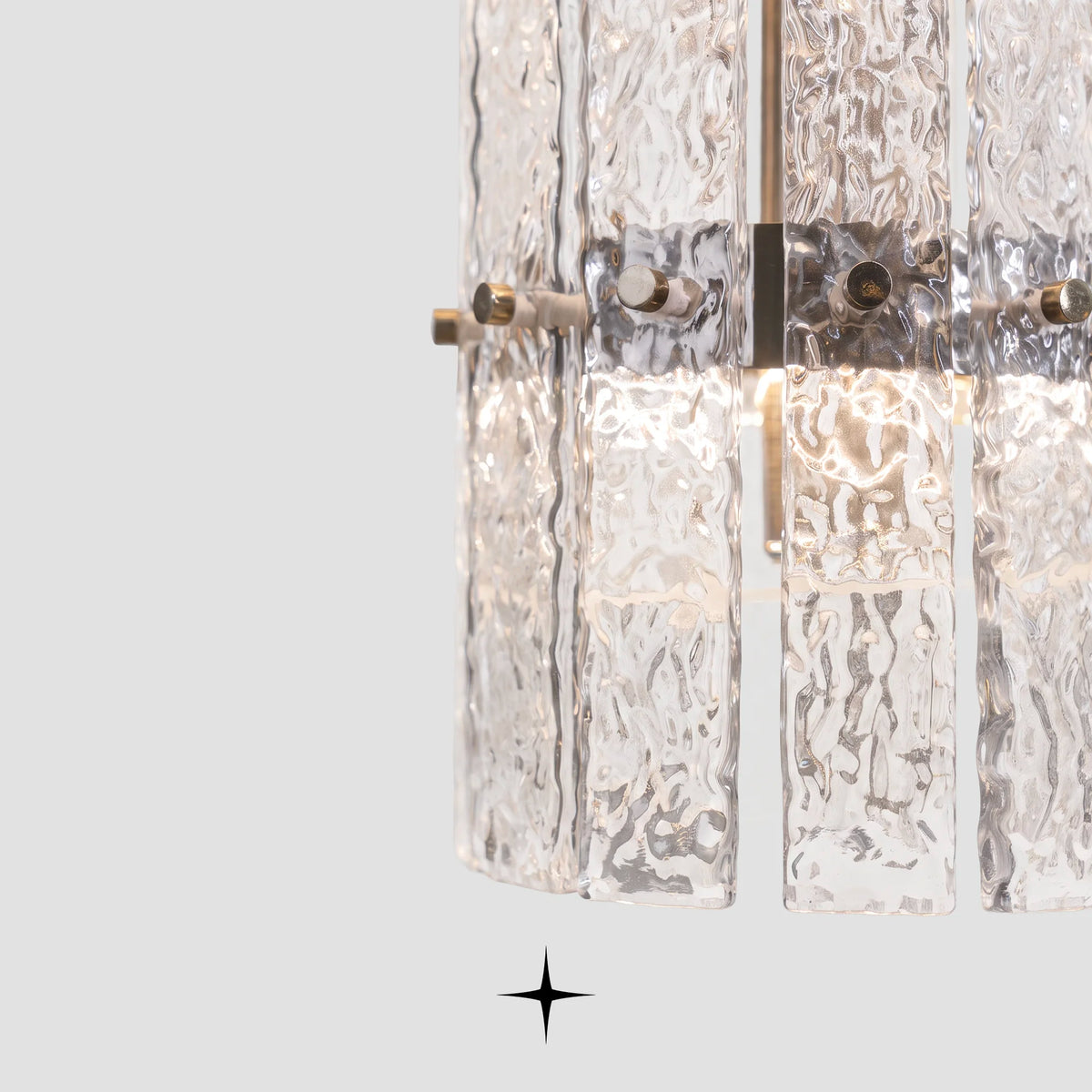 Close-up detail of handmade rock-crystal effect glass diffusers on Two Level Chime fixture