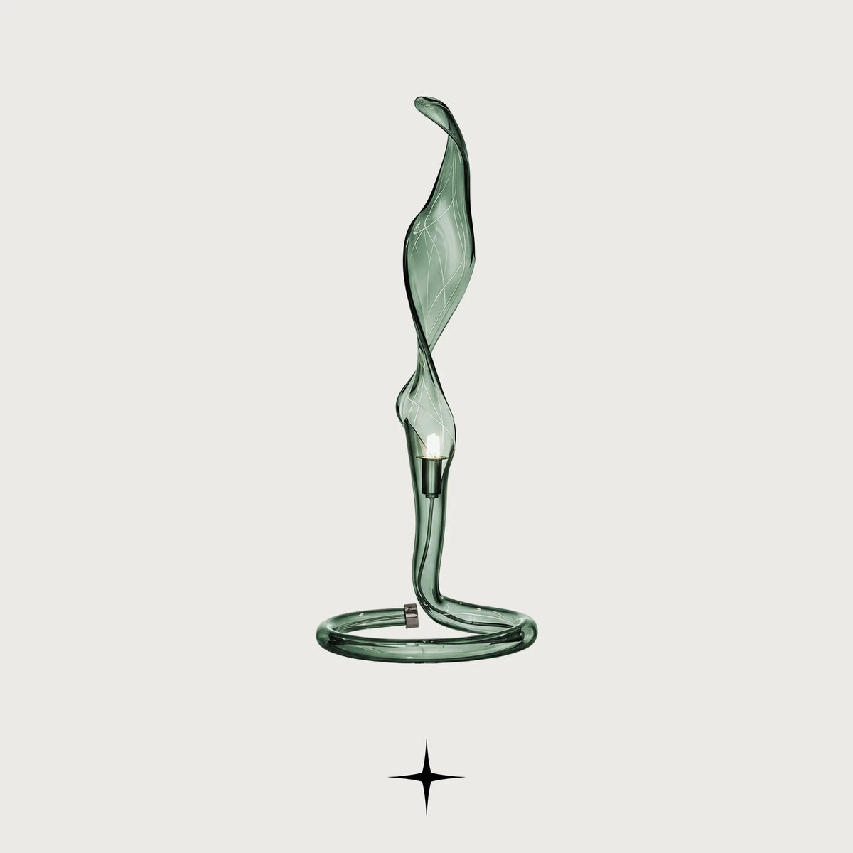 Veda modern sculptural fluid glass table lamp with metallic ring base on a light grey background