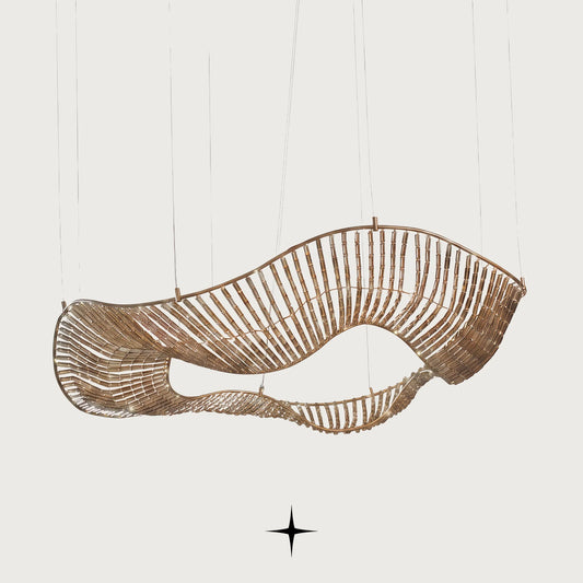 Vortex floating wave-shaped gold crystal chandelier on light grey background