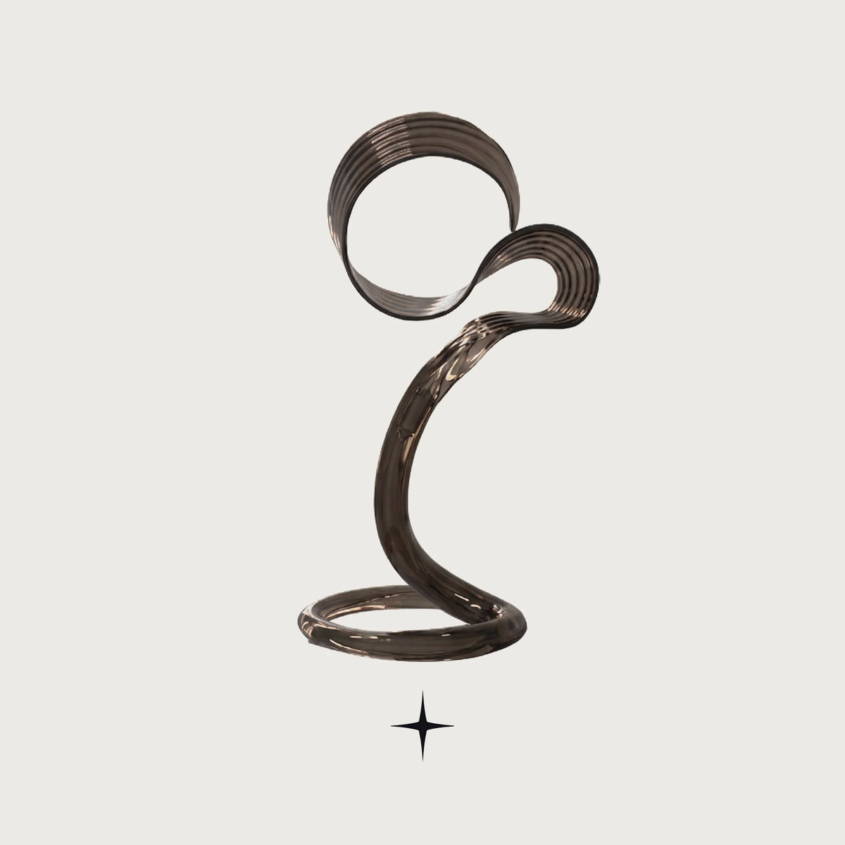 Yara modern sculptural swirl table lamp with metallic finish on a light grey background