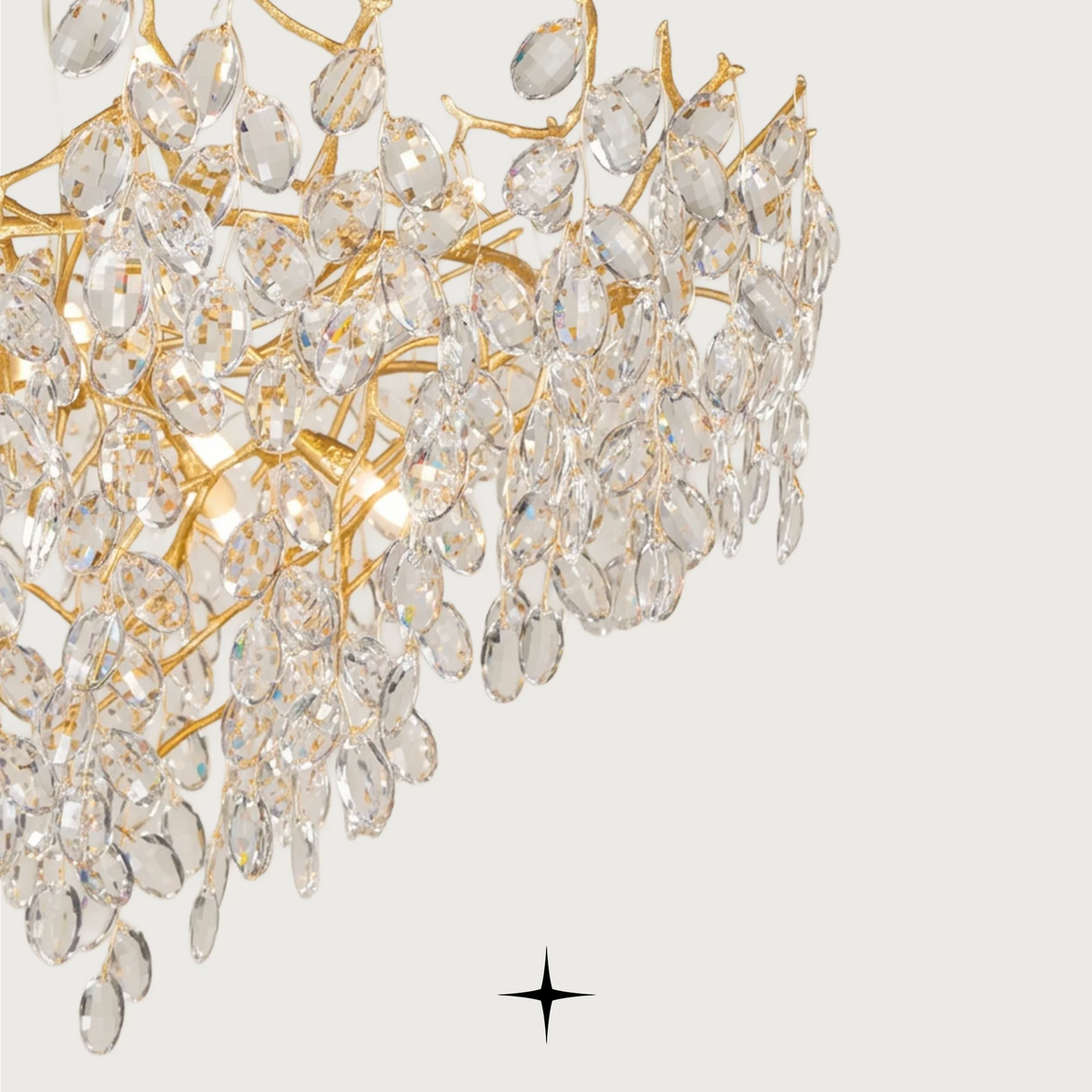 Zinnia luxury chandelier with cascading brass branches and faceted crystal drops