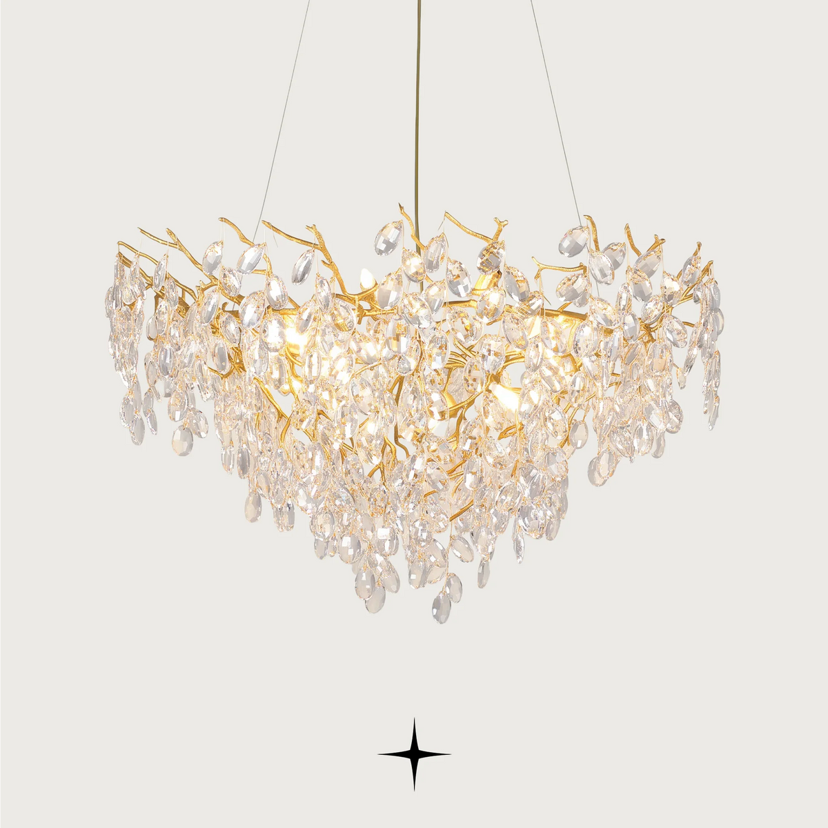 Zinnia luxury chandelier with cascading brass branches and faceted crystal drops