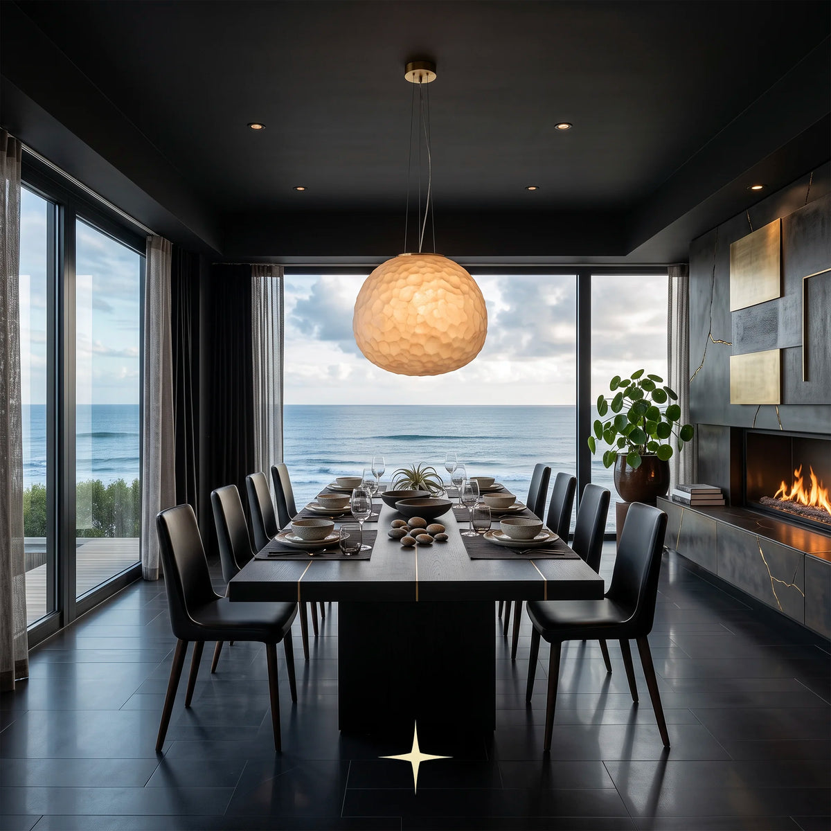 Warmly illuminated Lavish Zara spherical glass pendant light with gold accent attachment