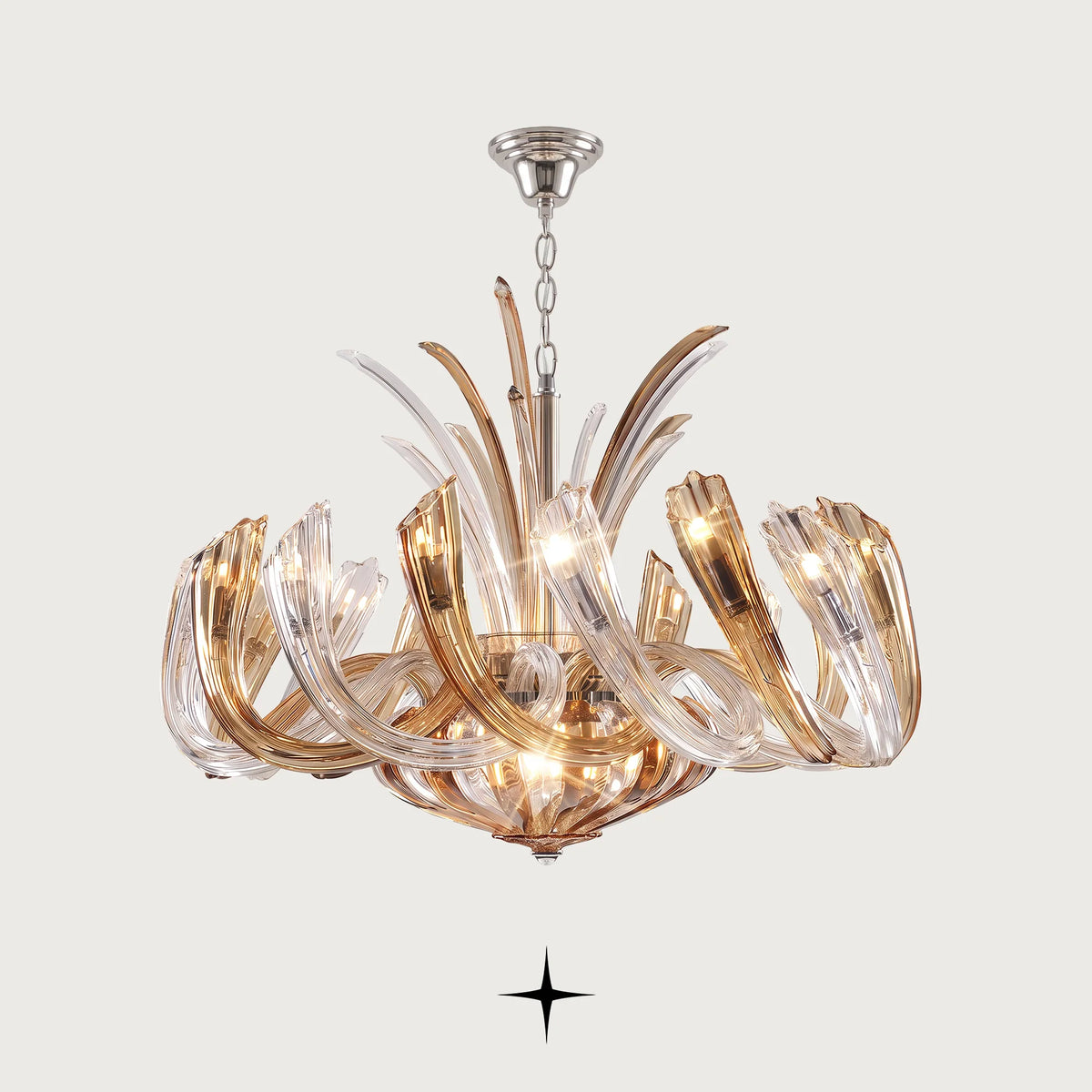 Clara Chandelier featuring chic elongated crystal arms with gold and silver ring options across four sizes
