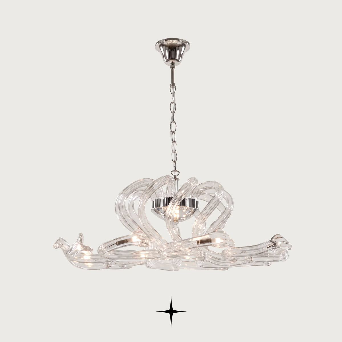 Cora Chandelier featuring shimmering crystals and sleek modern design in two sizes

