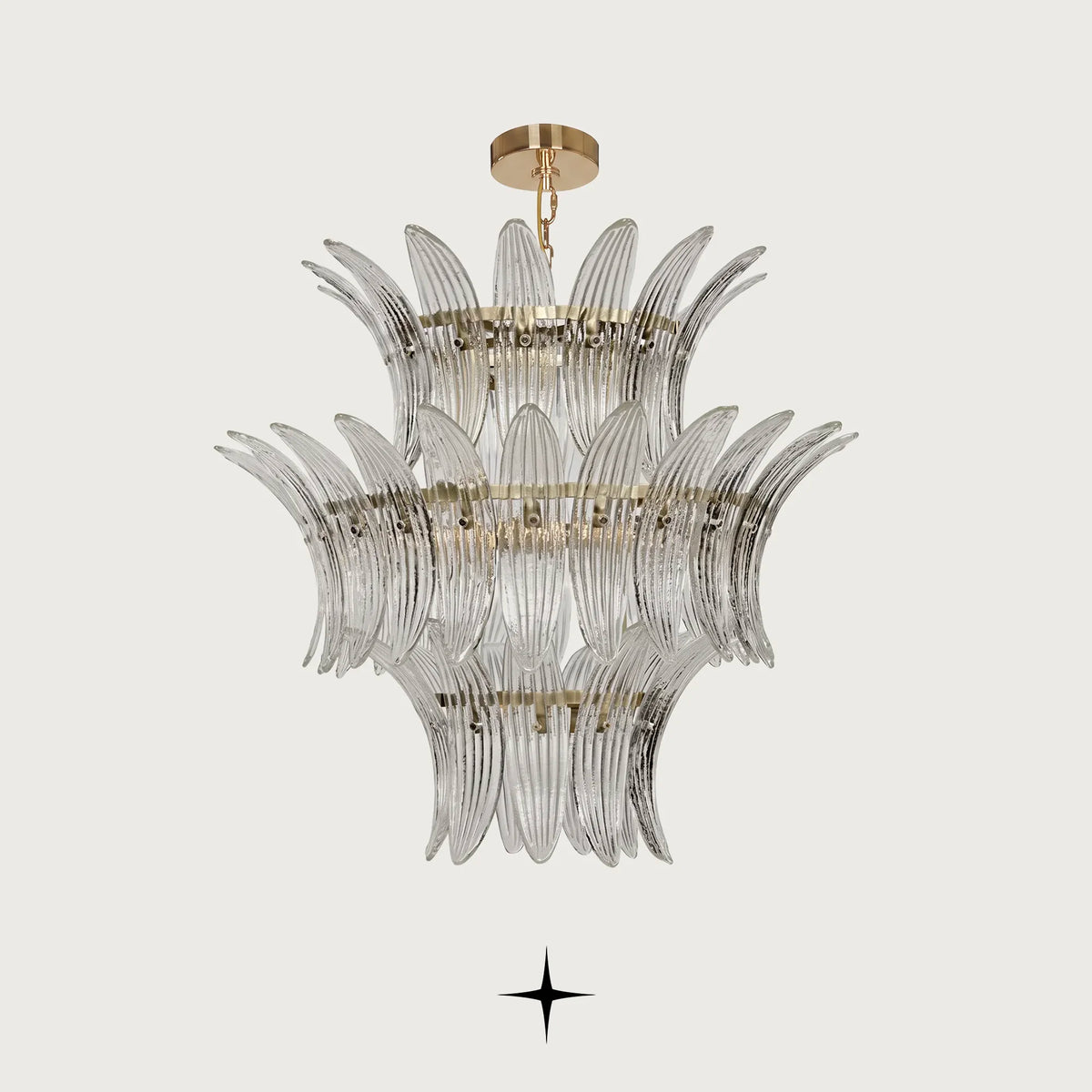 Crown Chandelier featuring tiered layers of Murano-style leaf-shaped glass and a radiant golden frame
