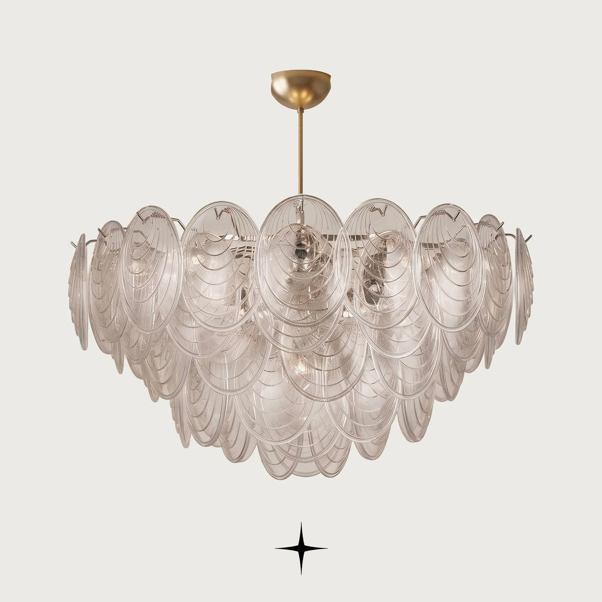 Elegant Moxie Chandelier featuring handcrafted Murano-style glass layered in an oval silhouette with a golden nickel chain and multi-tiered glass petals
