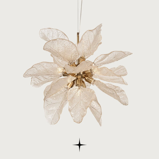 Full front view of Elegant Pristine white glass leaf floral pendant light on light grey backdrop