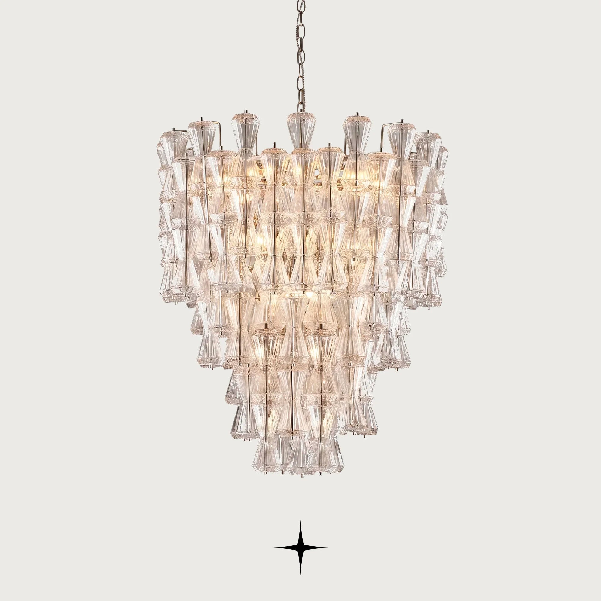 Elegant Seattle multi-tiered Rigadin glass hourglass chandelier illuminated on light grey background
