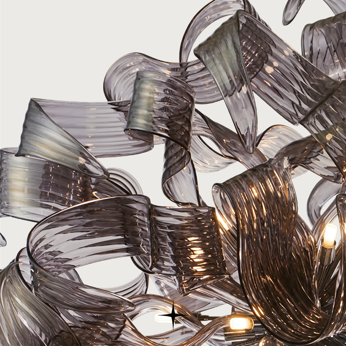 Emma Chandelier featuring intricate crystal arms and sapphire-like design with 20 G9 LEDs.
