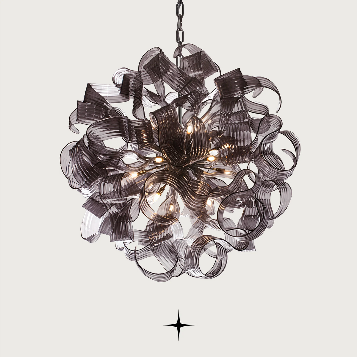 Emma Chandelier featuring intricate crystal arms and sapphire-like design with 20 G9 LEDs.
