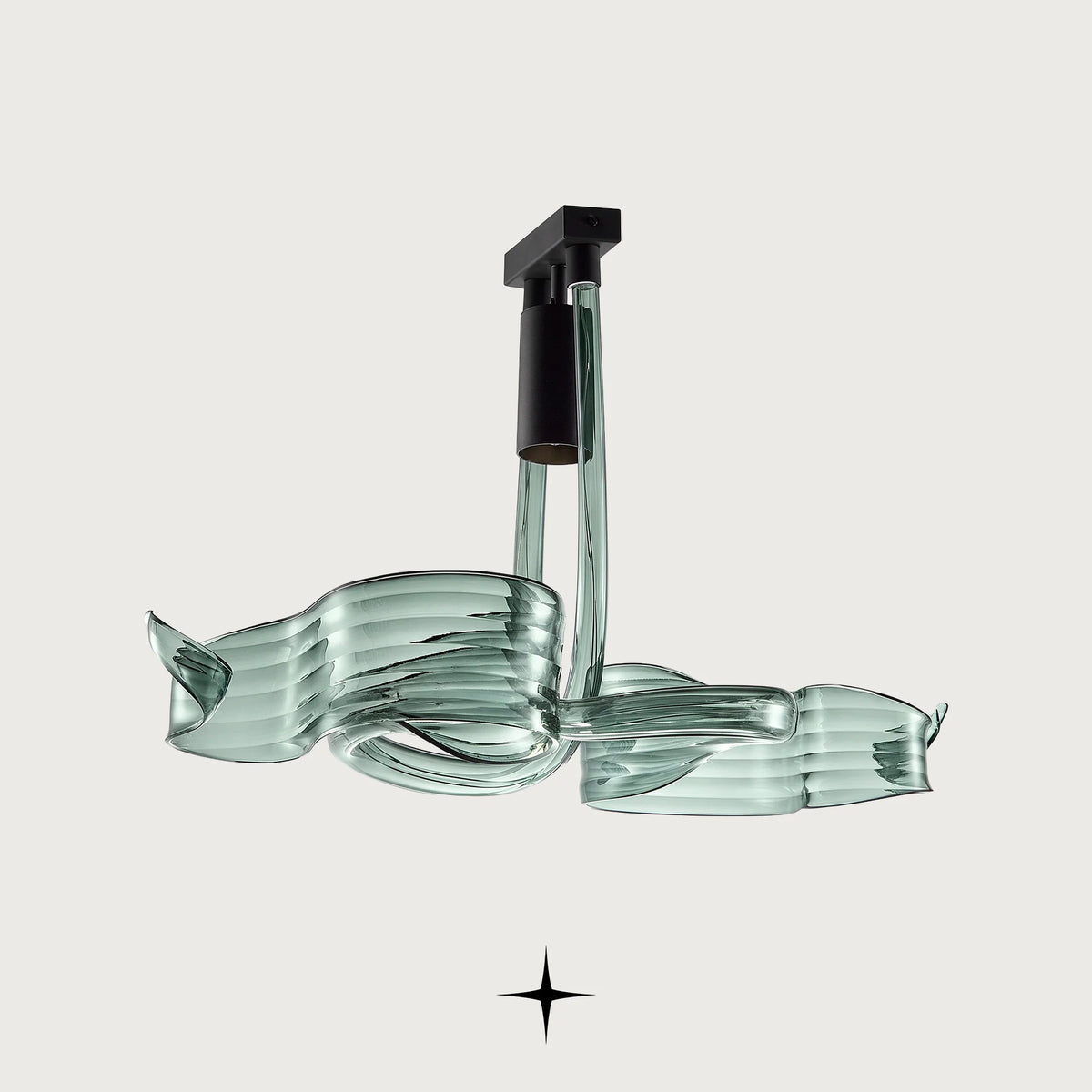 Flux modern chandelier featuring fluid green glass loops suspended from black hardware
