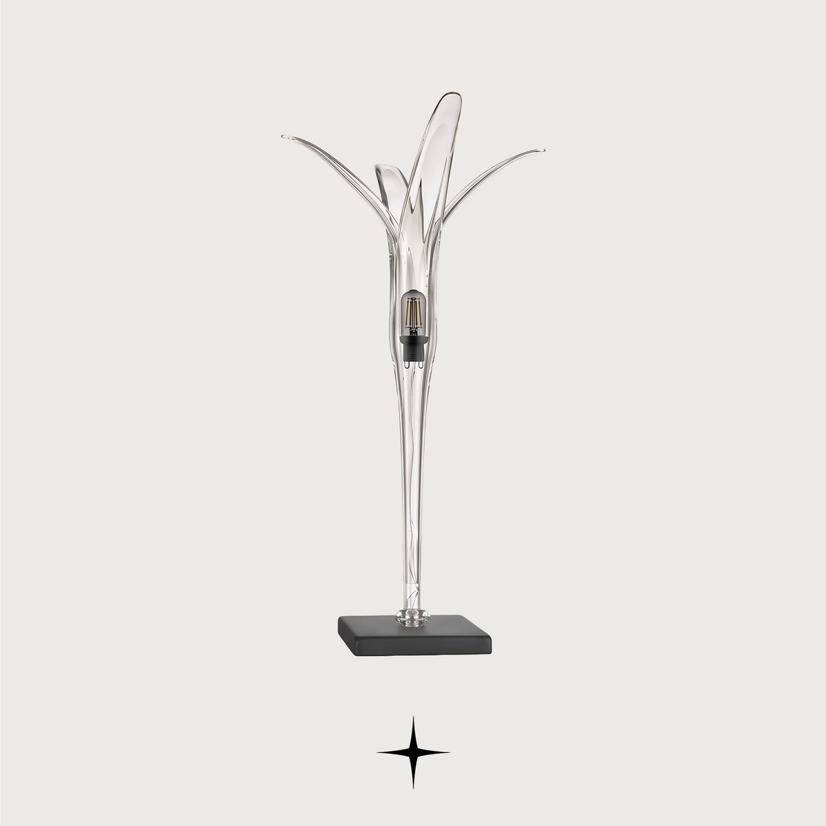 Calorina modern luxury table light with sleek dark teal and gold silhouette for sophisticated living spaces.
