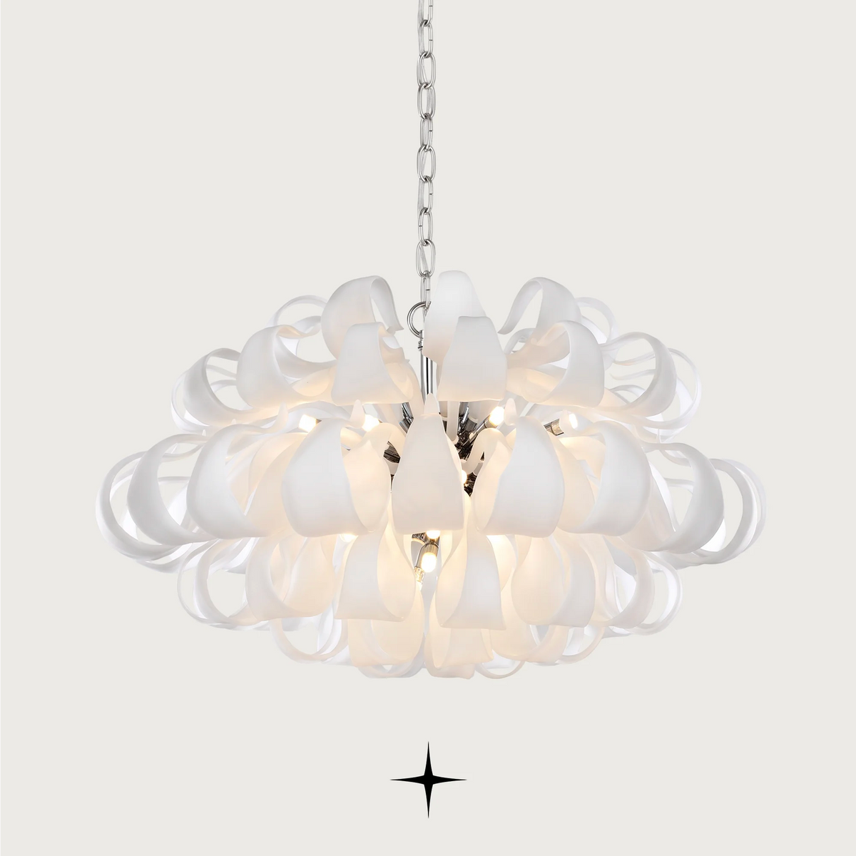 Grand Beatrix Chandelier featuring gracefully curved white bohemian crystal arms available in three sizes.
