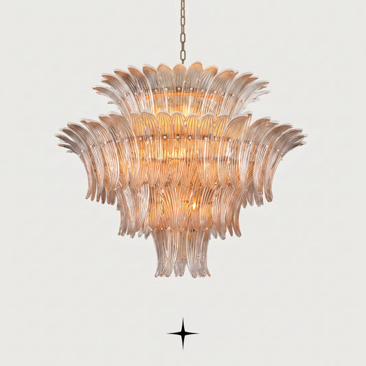 Grand Crown tiered Murano glass leaf chandelier with gold frame illuminated on black background