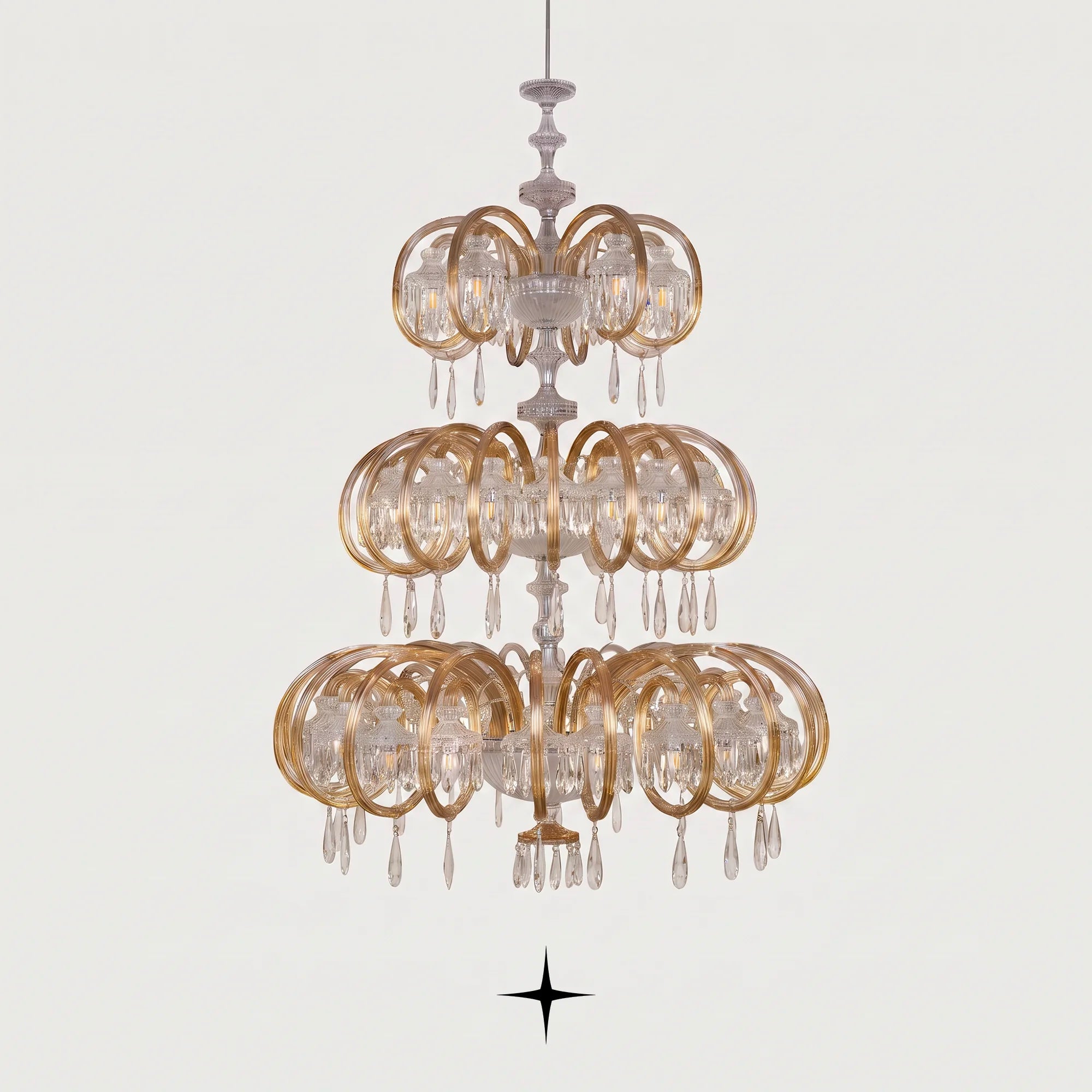 Grand Elegance multi-tiered circular crystal chandelier with gold rings on a light grey background