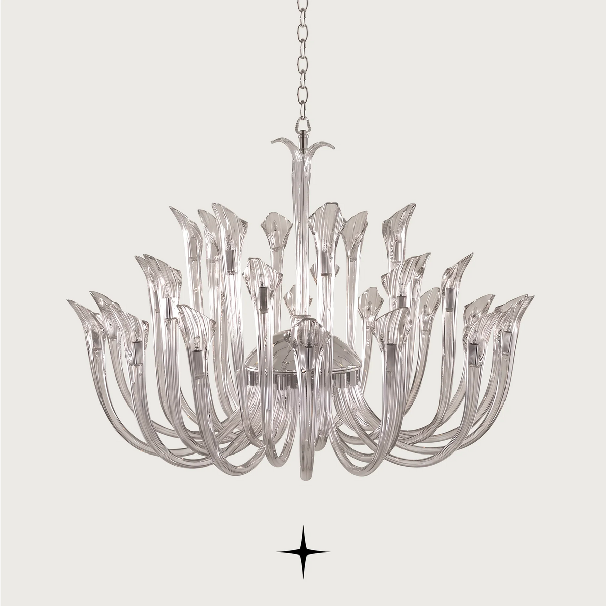 Grand Flare Chandelier featuring sophisticated curves and crystal elements casting enchanting light patterns.
