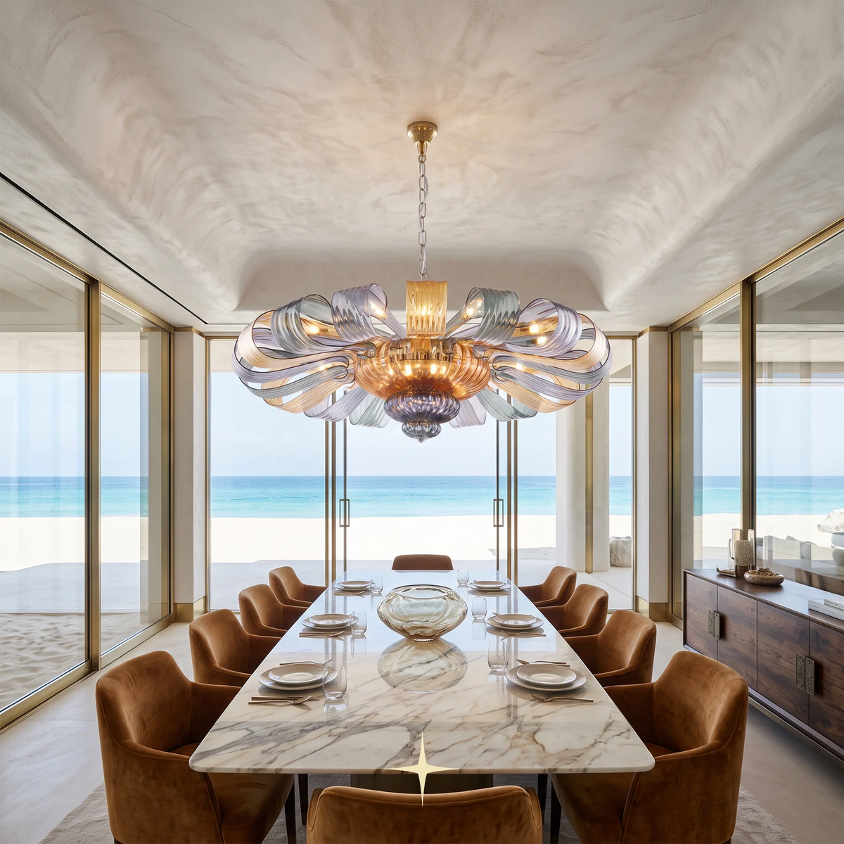 Grand Georgina Chandelier featuring symmetrical crystal artistry and sophisticated matte white and mixed hue options.

