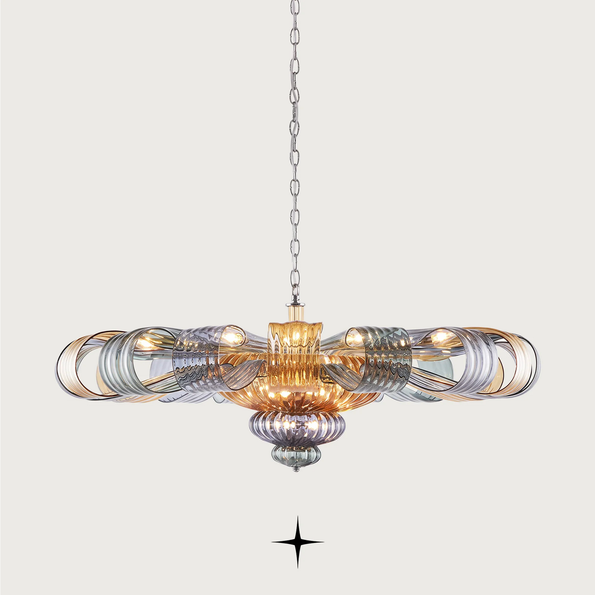 Grand Georgina Chandelier featuring symmetrical crystal artistry and sophisticated matte white and mixed hue options.

