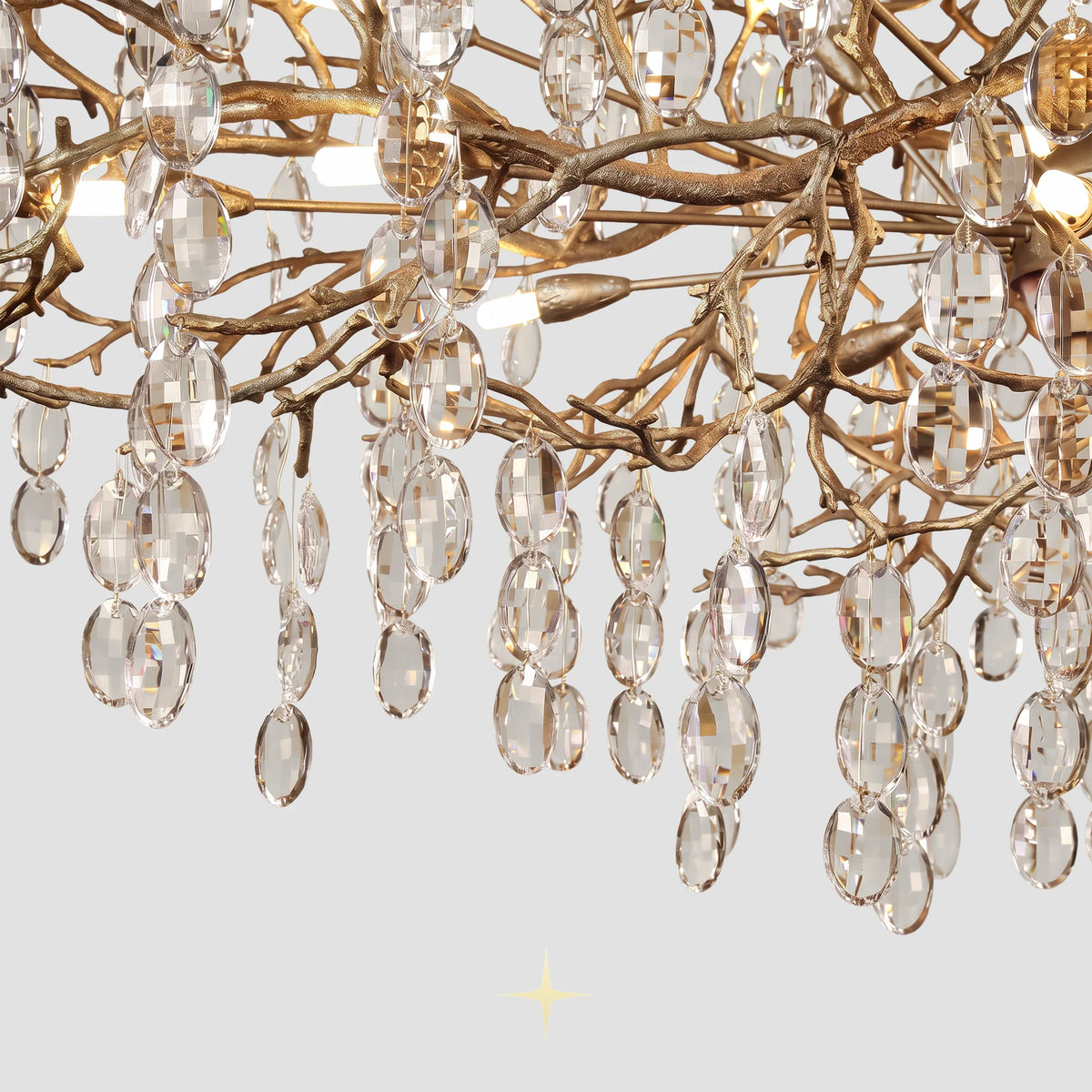 Close-up detail of cascading faceted crystal droplets on Grand Gloria gilded branches