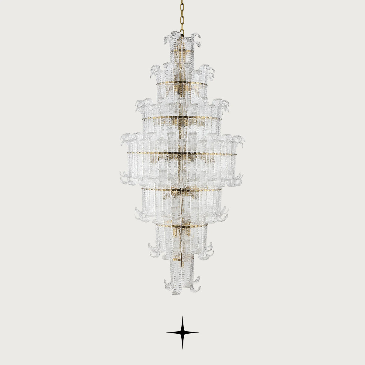 Front view of Grand Montreal tall crystal leaf chandelier on light grey backdrop