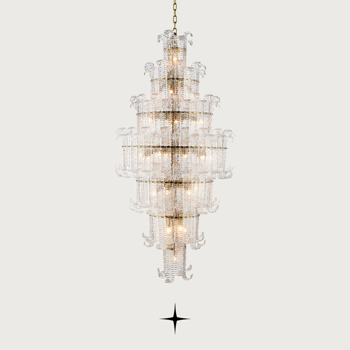 Grand Montreal multi-tiered Murano glass leaf chandelier illuminated on a light grey background