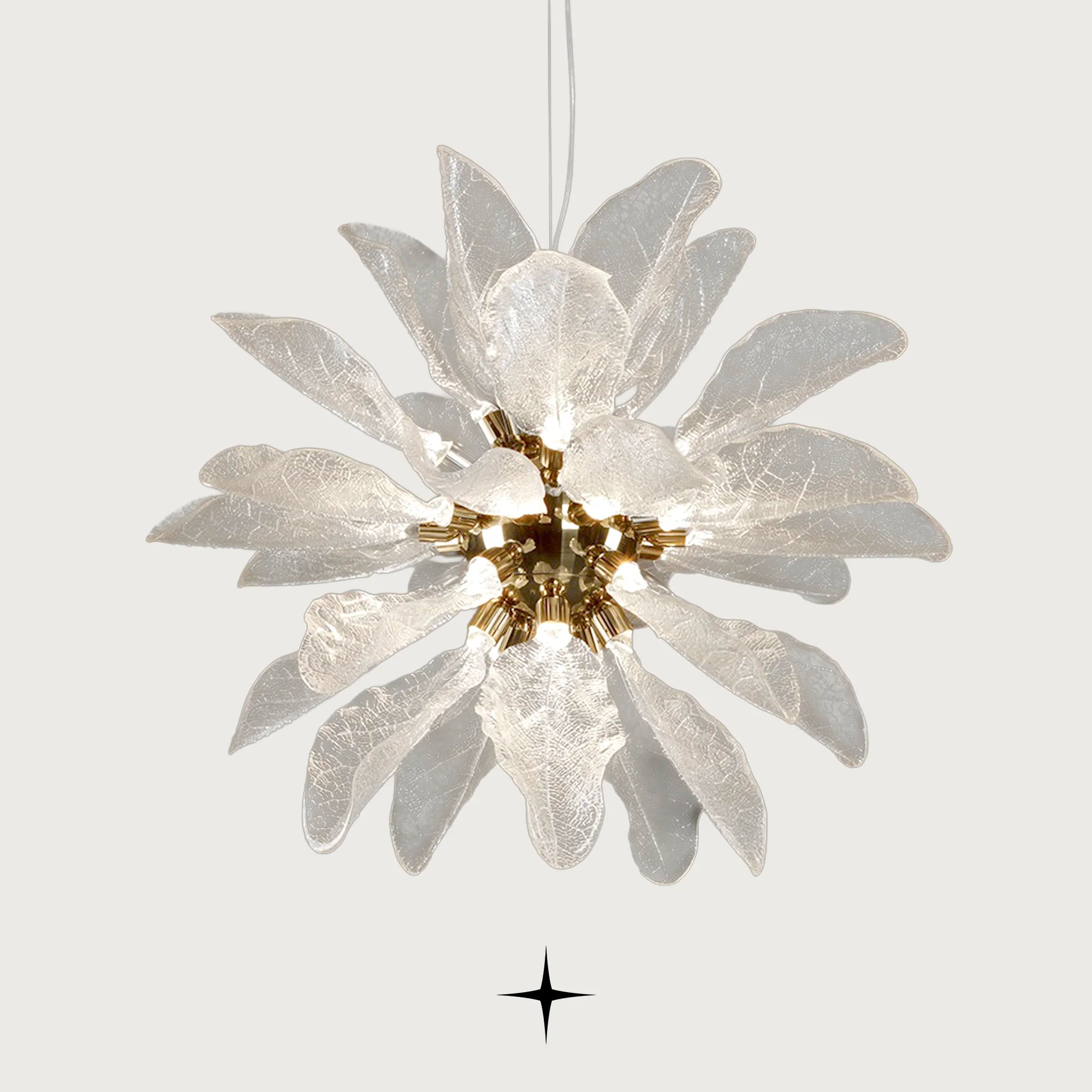 Grand Pristine Murano-style glass leaf chandelier with warm glow on light grey background