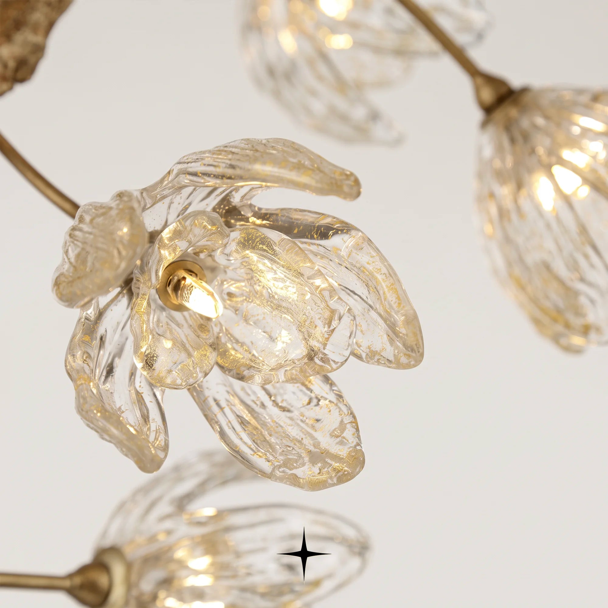 Close-up of illuminated crystal glass flowers on the Grand Sakura chandelier