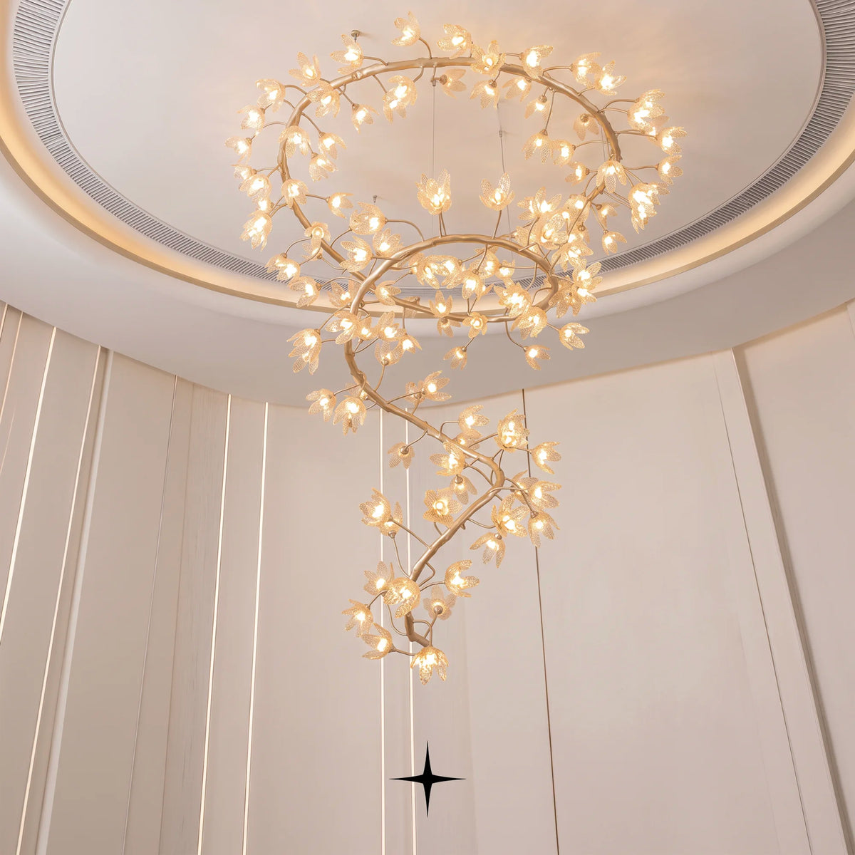 Grand Sakura spiral chandelier installed in a luxury modern double-height living room setting