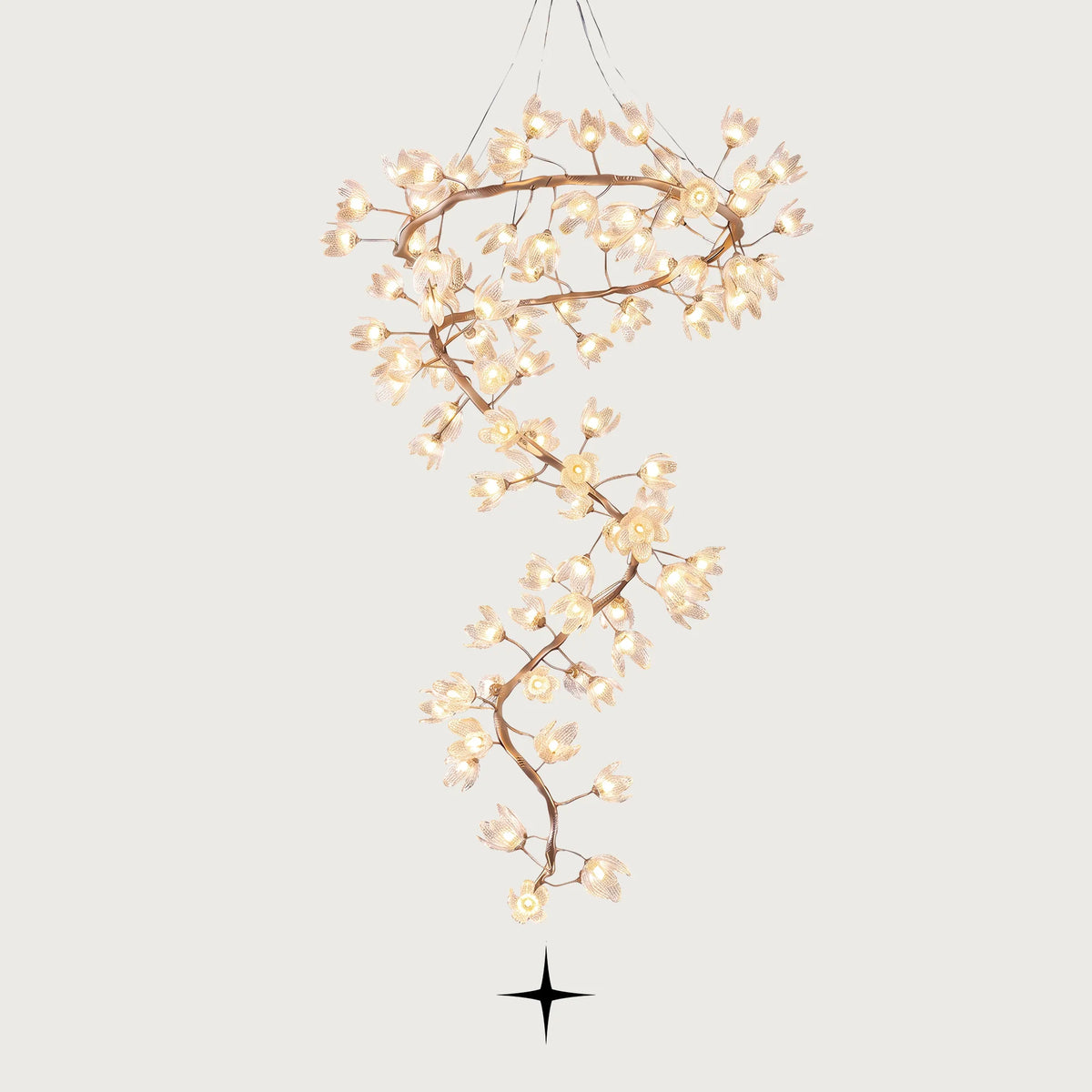 Full view of the Grand Sakura spiral crystal flower chandelier with hand-forged metal branches on a grey background