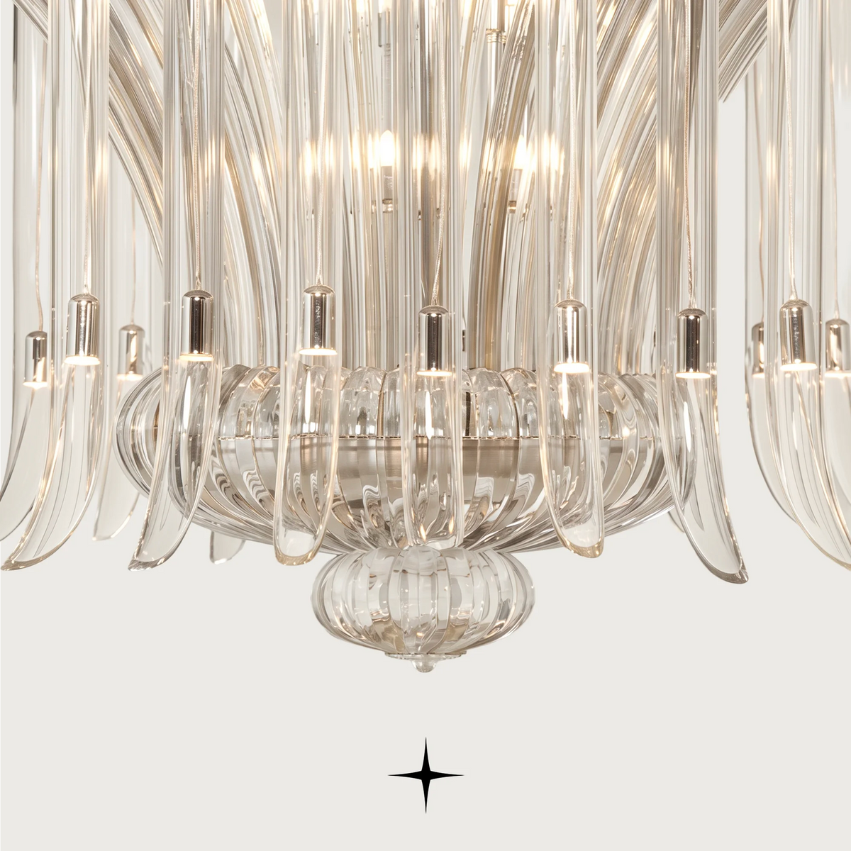 Grand Shanon Chandelier featuring cascading multi-colored crystal wings and intricate falling arms design.
