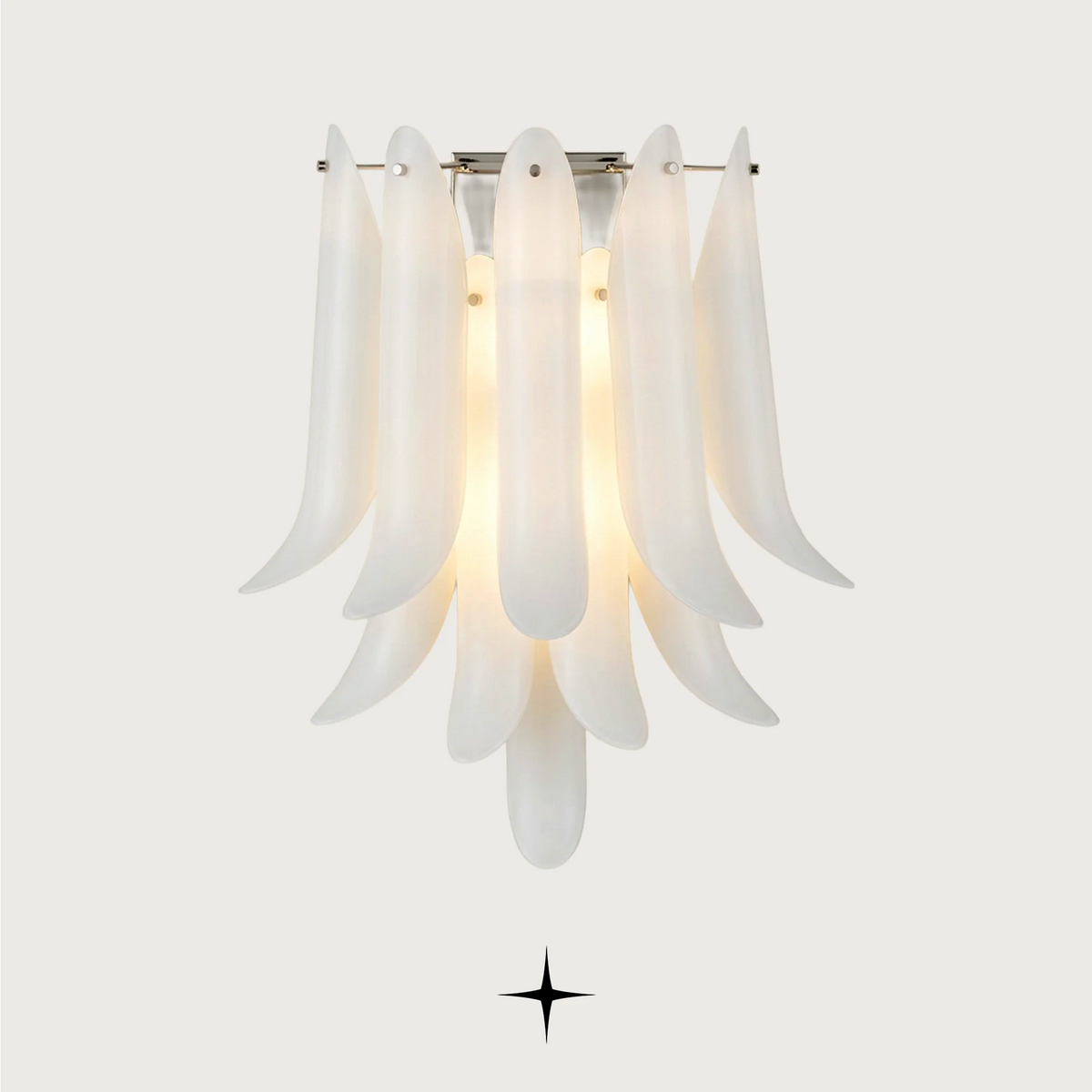 Juliette Wall light fixture featuring handcrafted crystal wings with pure white exteriors and golden interiors.
