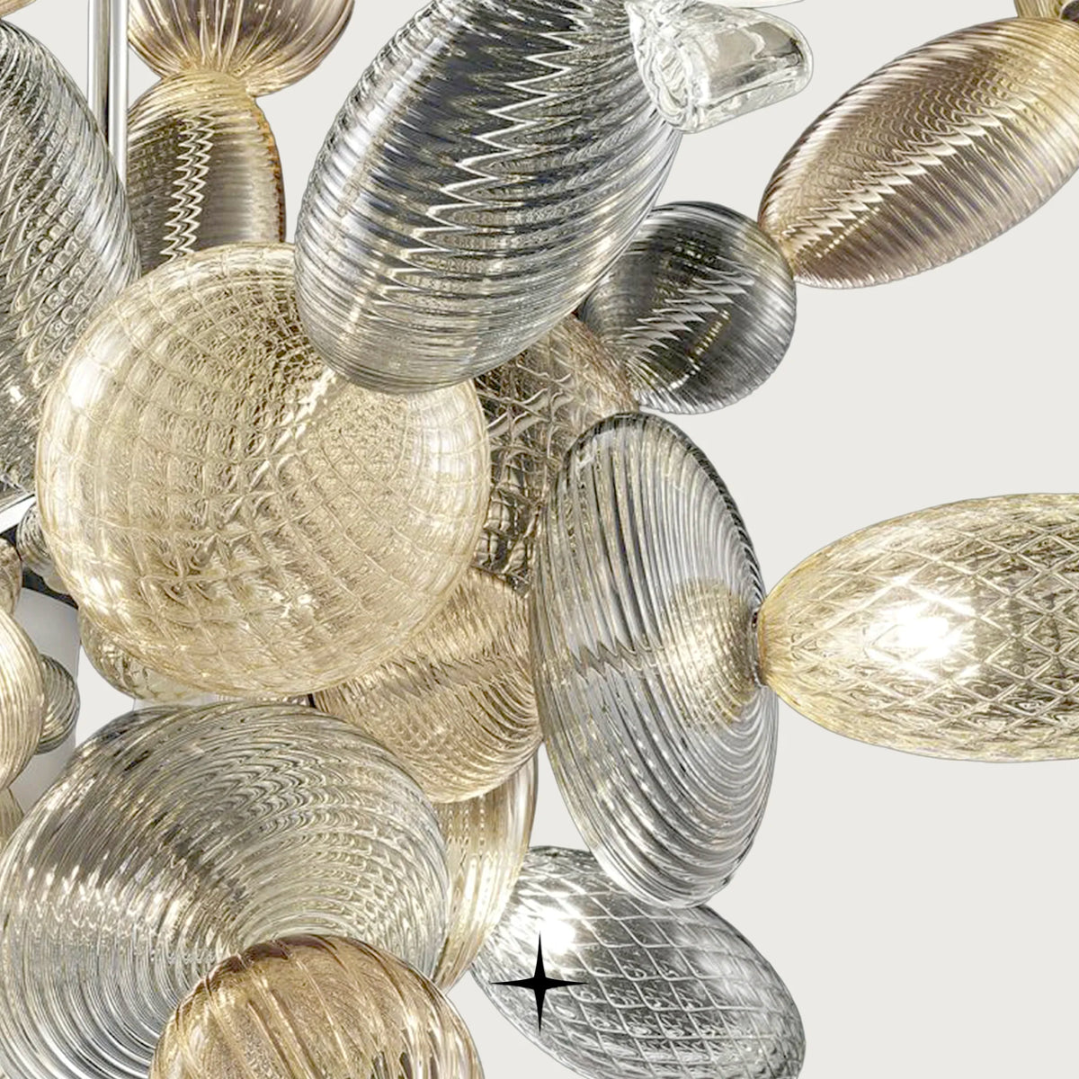 Close-up detail of ribbed and textured glass elements on Lambada chandelier