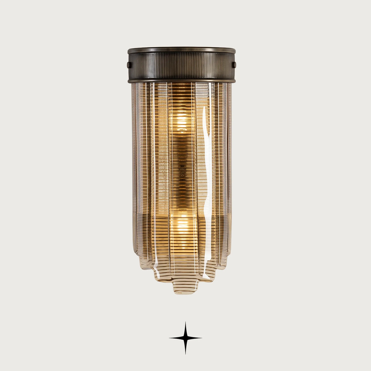 Lantern modern ribbed amber glass wall sconce on a light grey background