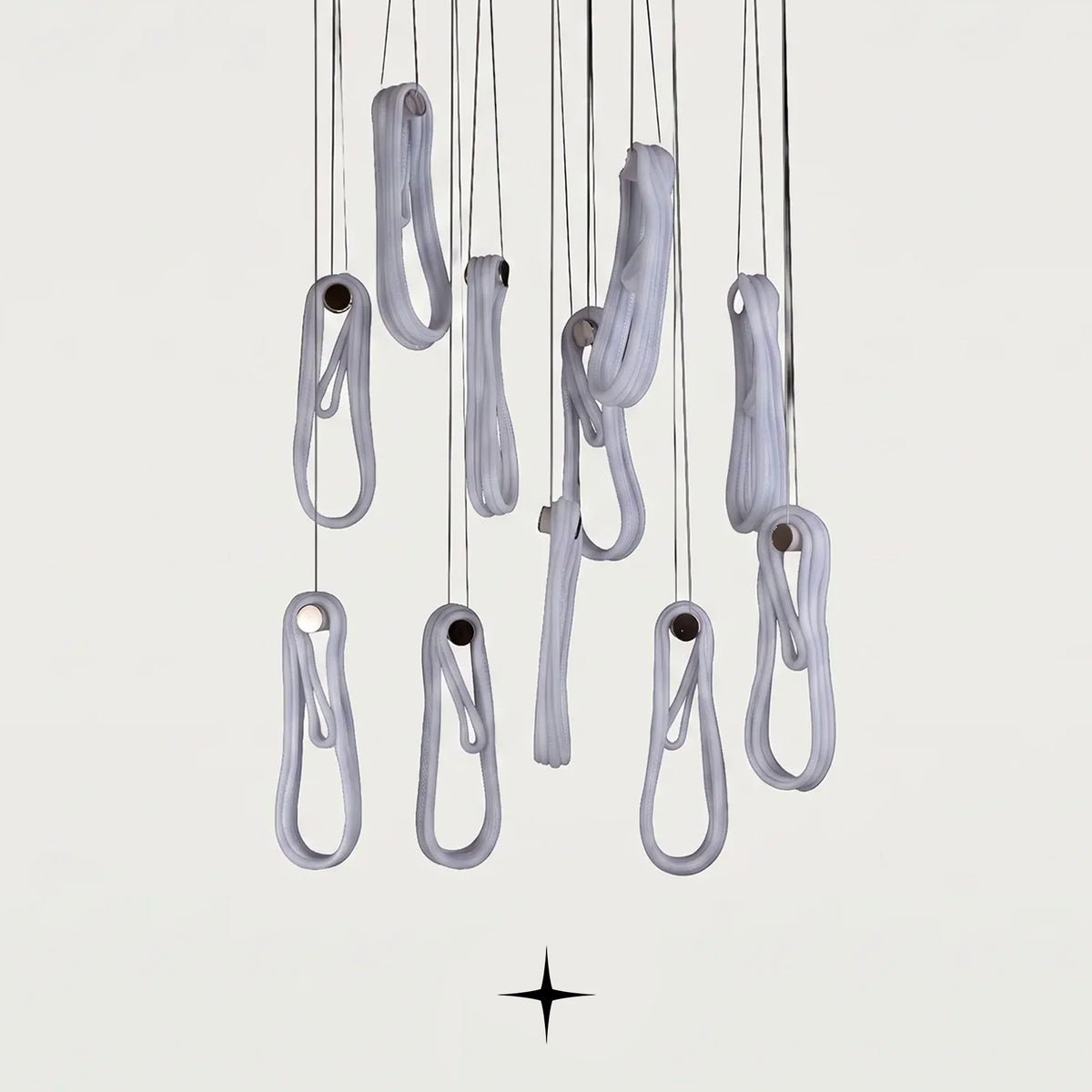 Lavadora twisted glass chandelier suspended in a modern luxury bedroom setting