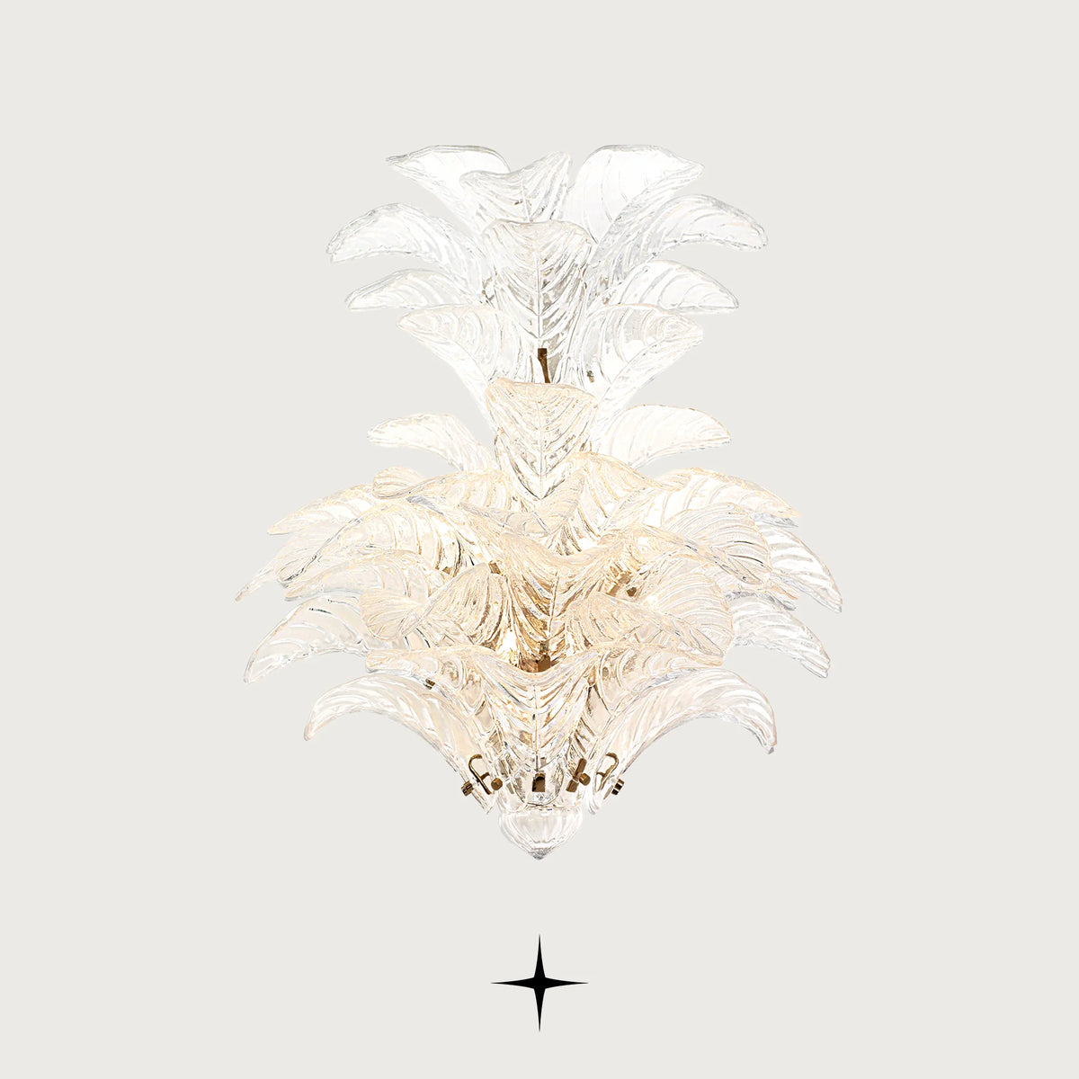 Lavish Madam Murano glass leaf wall sconce with golden nickel frame on a light grey background