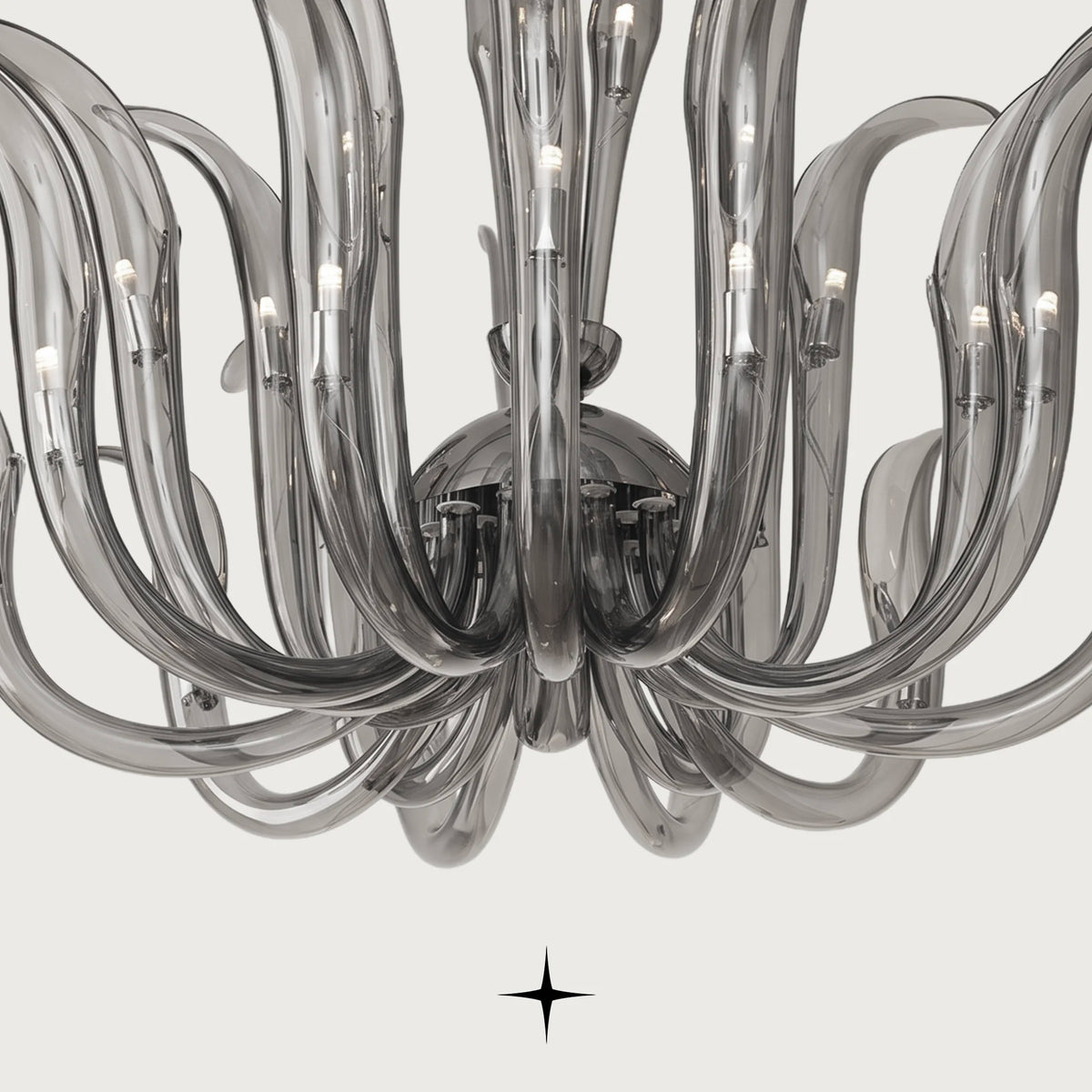 Lavish Finesse Chandelier featuring sweeping smoky crystal blades inspired by organic flame forms
