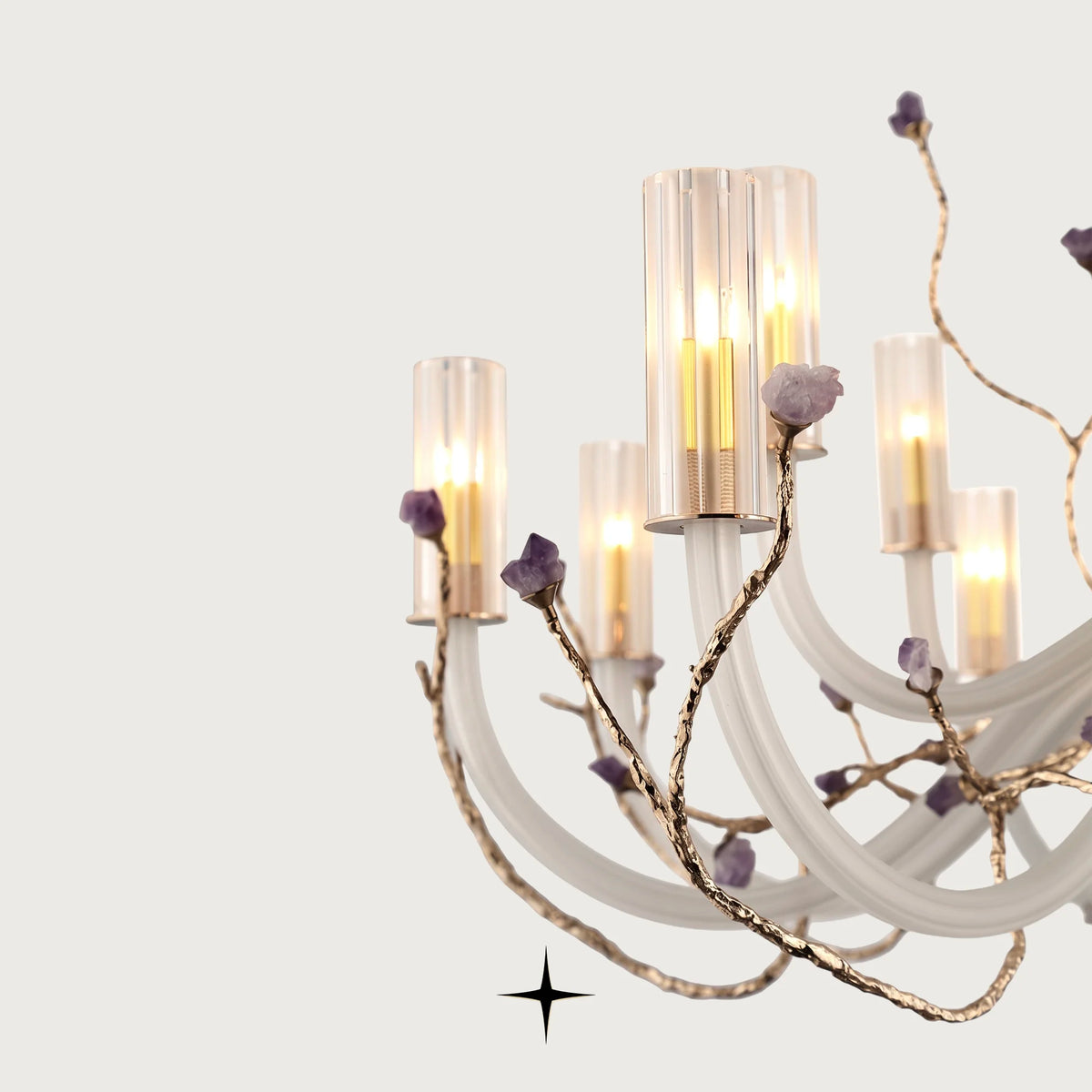 Close-up view of illuminated glass diffusers and brass branches on Lavish Madison chandelier
