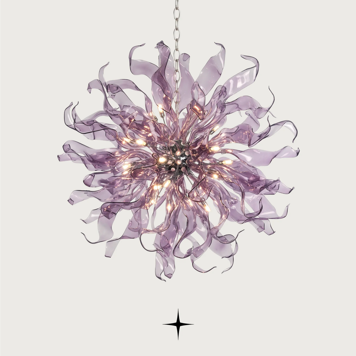 Lavish Magnificia Chandelier featuring 58 arms with 25 G9 LEDs in a grand spherical design available in four stunning sizes.
