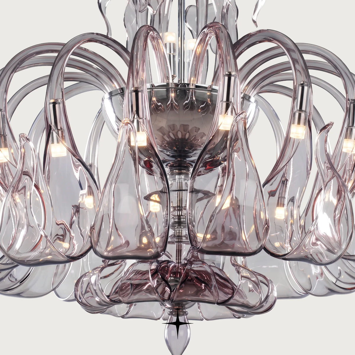 Lavish Matilda Chandelier featuring elongated bohemian crystal arms in vibrant hues across four size variants
