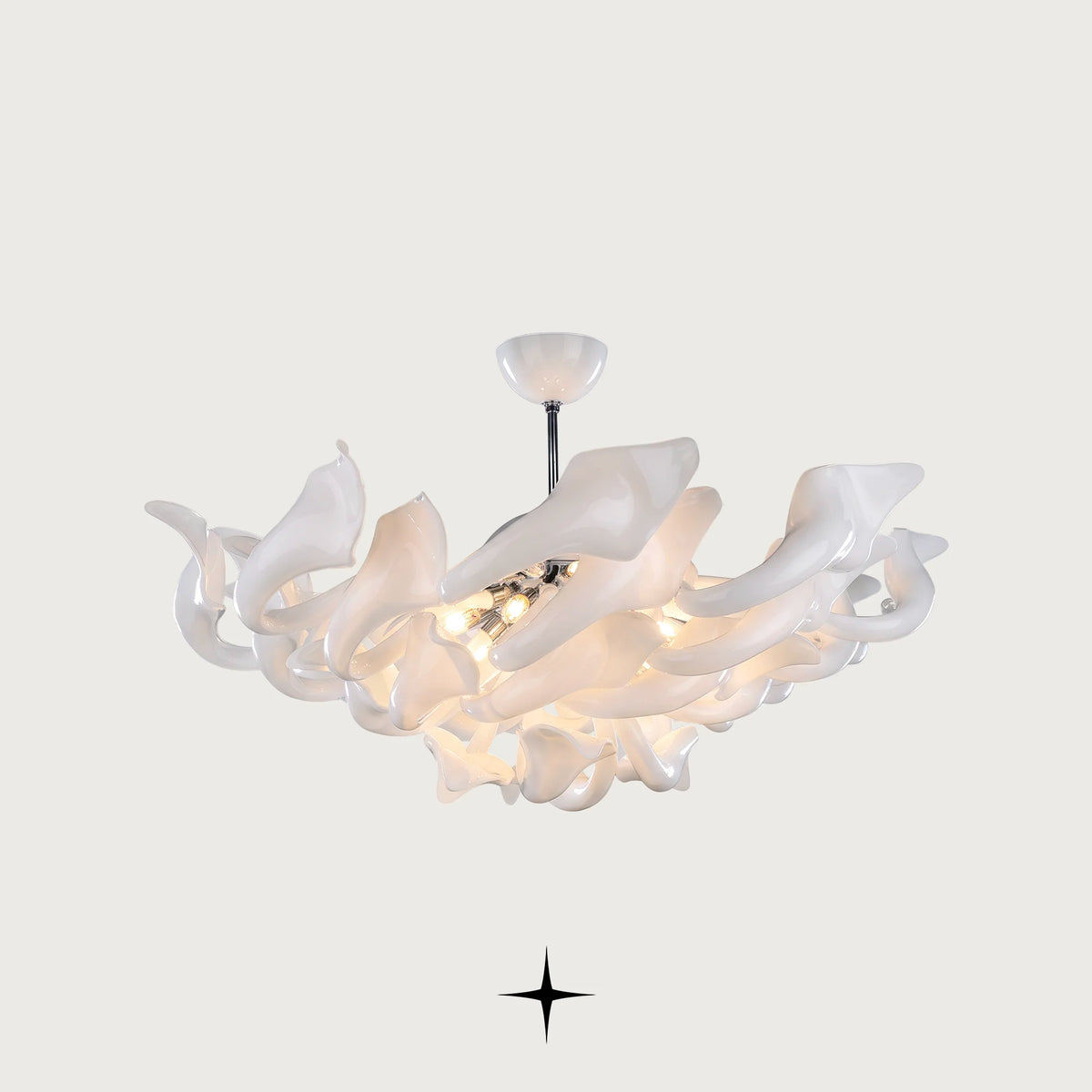Lavish Naria Chandelier featuring chic elongated white crystal arms in multi-tier configurations
