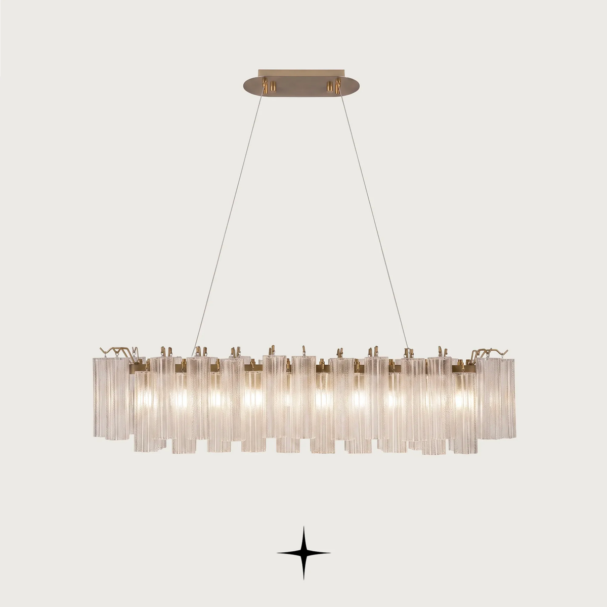 Linear Astra Ribbed Glass Tube Chandelier featuring fluted glass tubes and a premium brass alloy frame.
