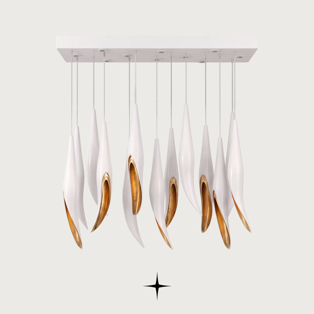 Linear Bella chandelier featuring cascading white flowers adorned with a brilliant heart of gold
