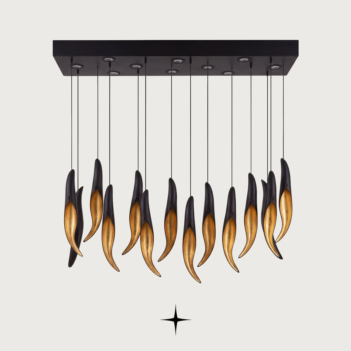Linear Darken chandelier featuring a matte black layer over golden crystals and striking contrast

