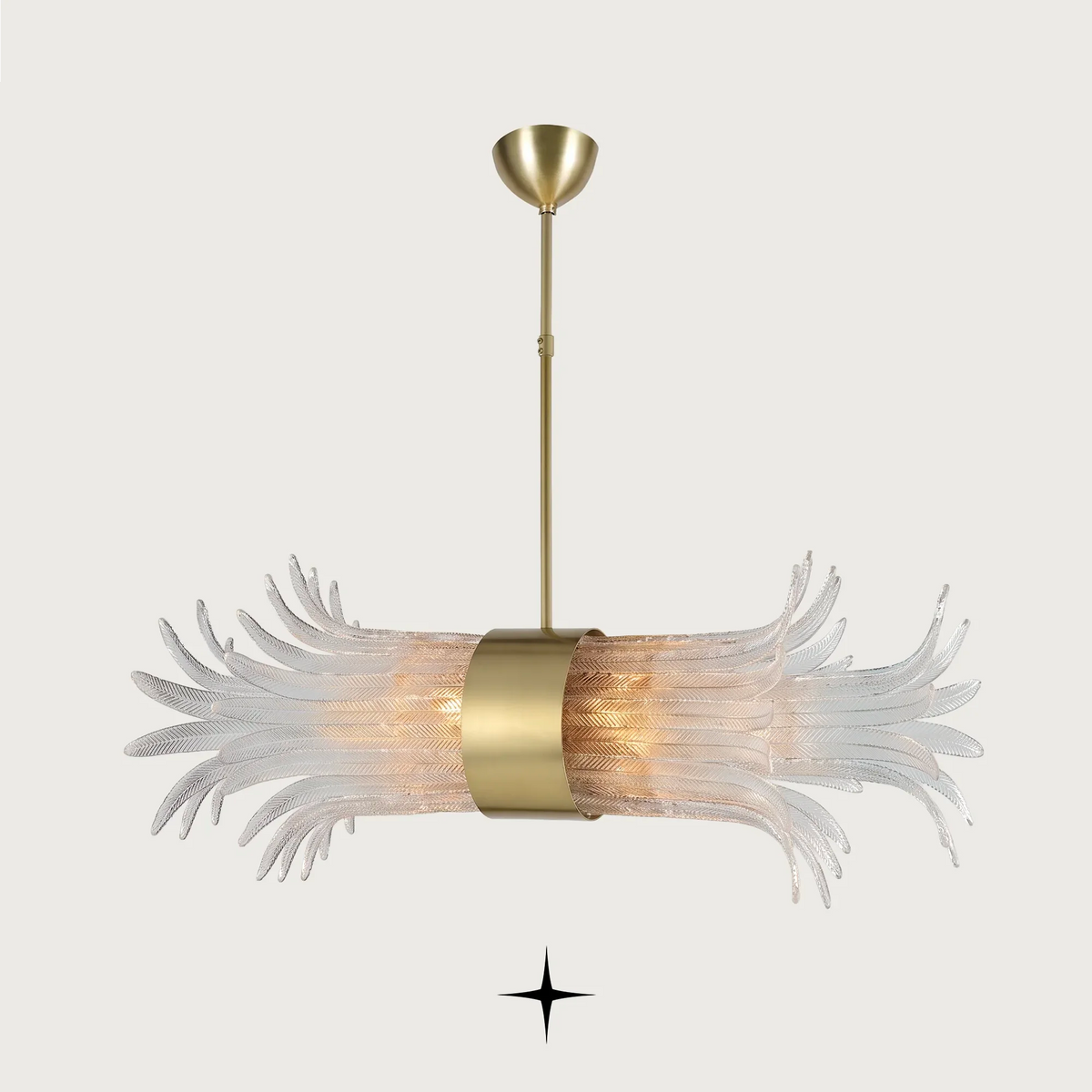 Linear Golden Falls chandelier with hand-blown glass feather diffusers and brass ring centerpiece

