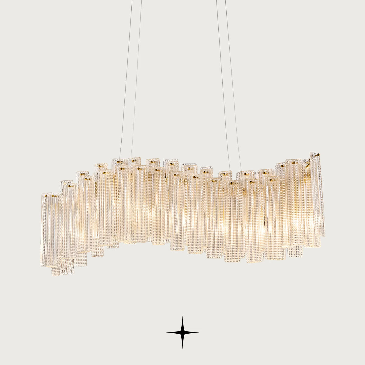 Linear Isabella crystal chandelier with gold frame and layered Murano-style glass bricks

